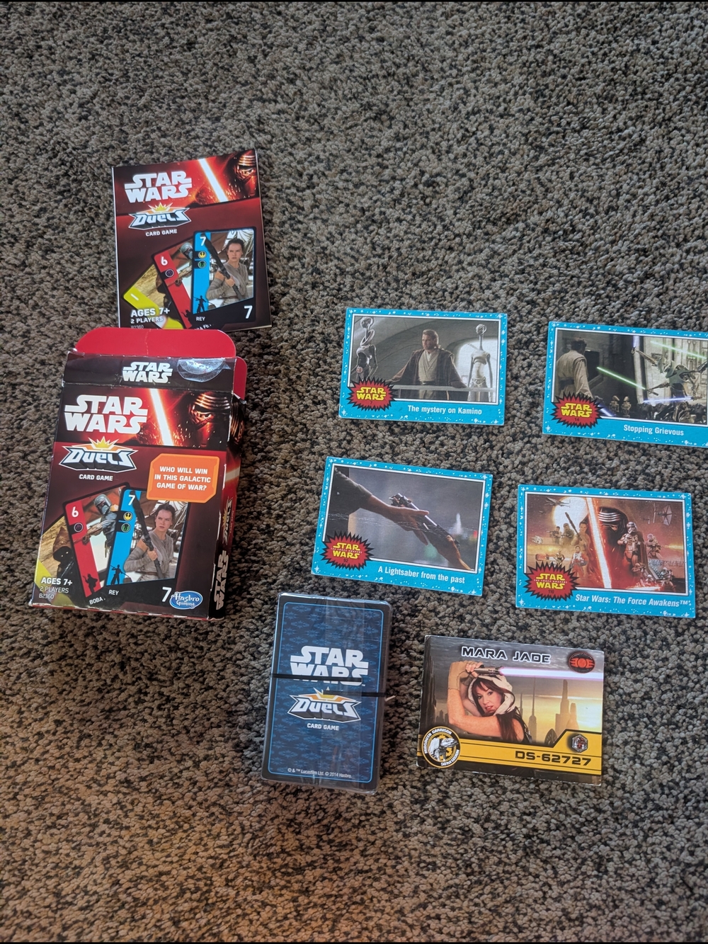 Star Wars Duels Card Game Box with Blue, Red, Yellow & Black Accents